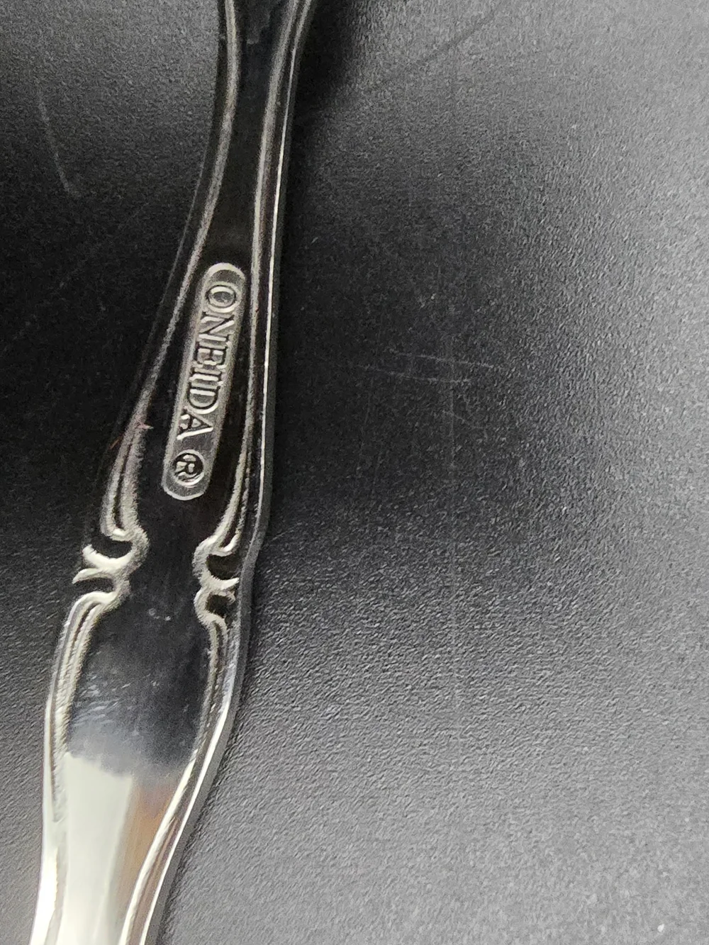 Oneida Silver Tone Ornate Serving Spoon